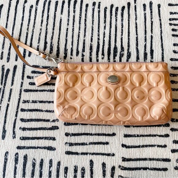 COACH Pink Embossed Signature Patent Wristlet - Picture 1 of 7